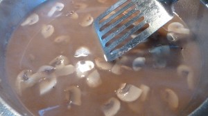 Add flour and broth mixture you have shaken, and bring to a boil. 