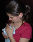 Sarah holds Susannah Rose.