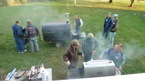 How many Presbyterian men does it take to grill a few hamburgers, veggie burgers and hot dogs these days?