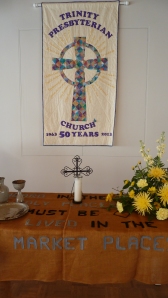 New banner made by lifelong friends Susan, Ginny and Page. Altar cloth is one of Trinity's first ever banners of burlap, for the Marketplace House Church which ran a coffee house near Court Square in Harrisonburg for many years.