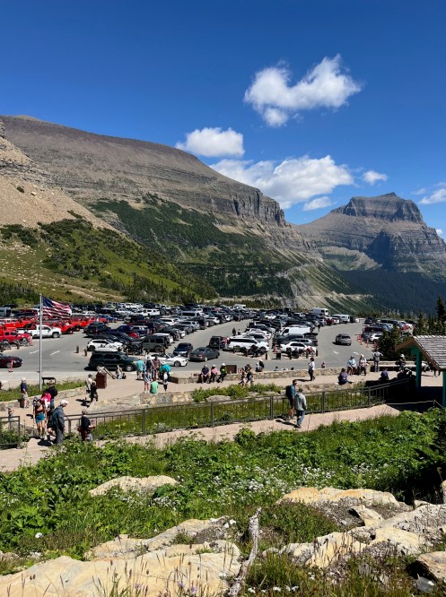 At the top of the Going to the Sun Road, there were cars and vehicles all over -- many visitors getting up very early to do this drive ... and then find parking.